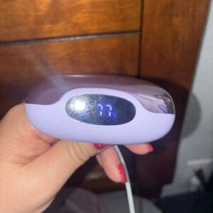 Purple Handheld Device with Display